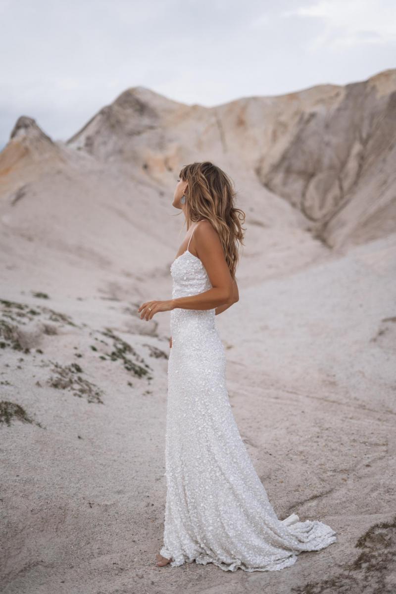 The Anya gown by Karen Willis Holmes, fit and flare v-neck beaded wedding dress.