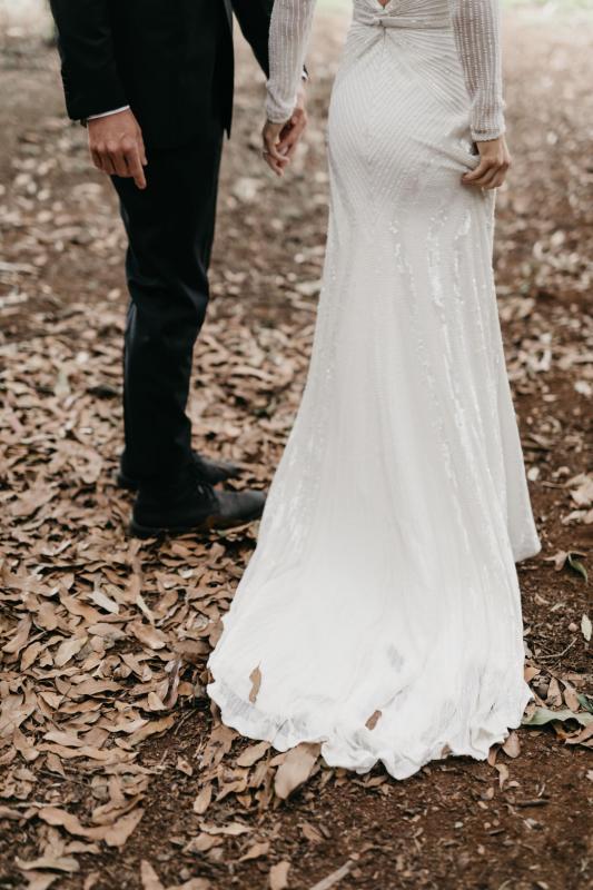 Real bride Taylor wore the Luxe Cassie wedding dress by Karen Willis Holmes.