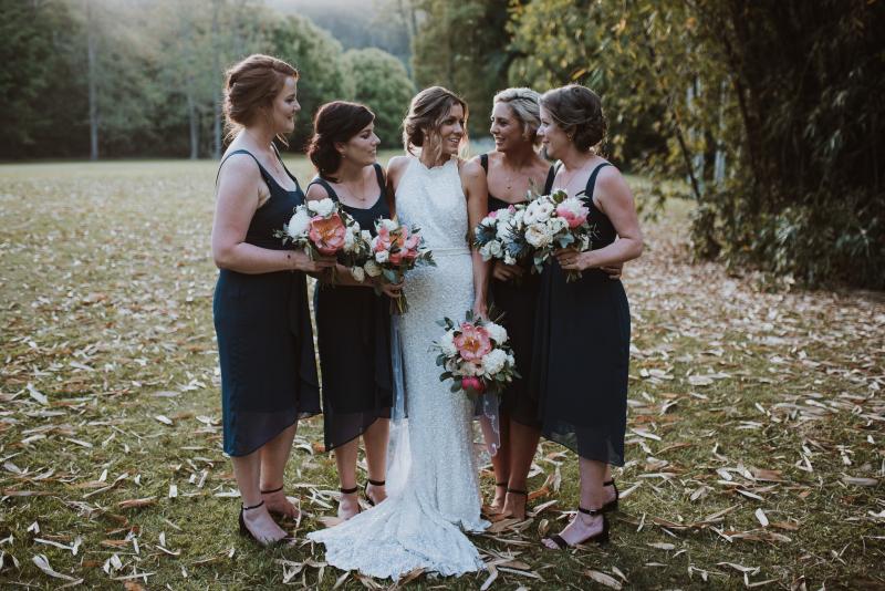 Real bride Mel wore the Luxe Cindy wedding dress by Karen Willis Holmes.