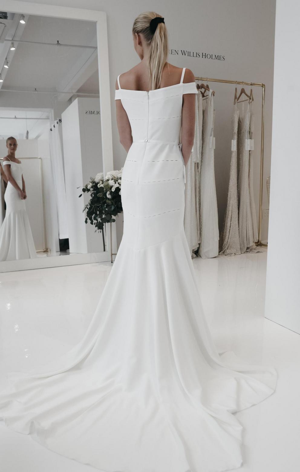 The Arianna gown by Karen Willis Holmes, nontraditional fit and flare off the shoulder wedding dress.