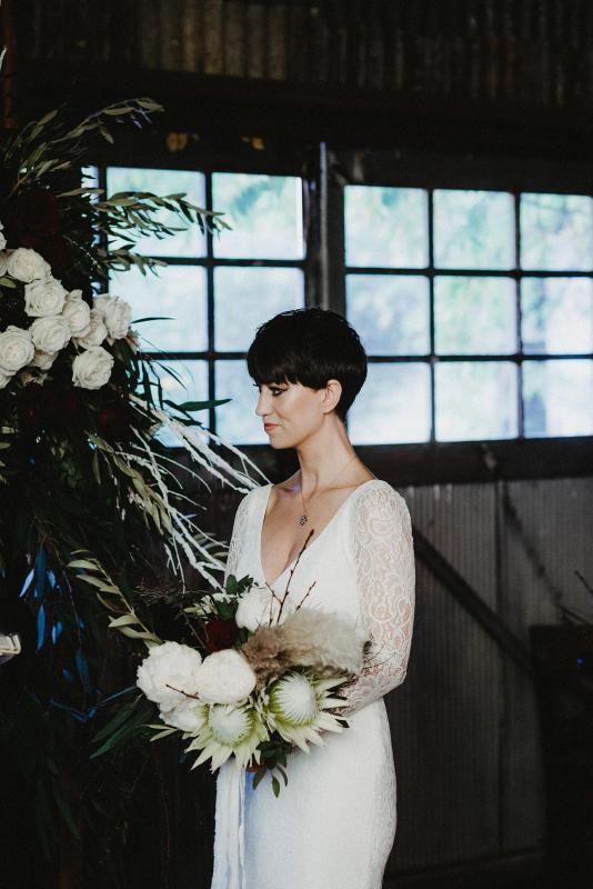 Real bride Kylee wore the Wild Hearts Valencia wedding dress by Karen Willis Holmes.