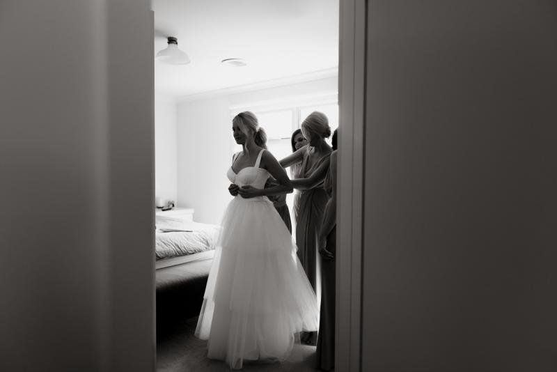 Real bride Peta wore the Bespoke Blake/Miley wedding dress by Karen Willis Holmes.