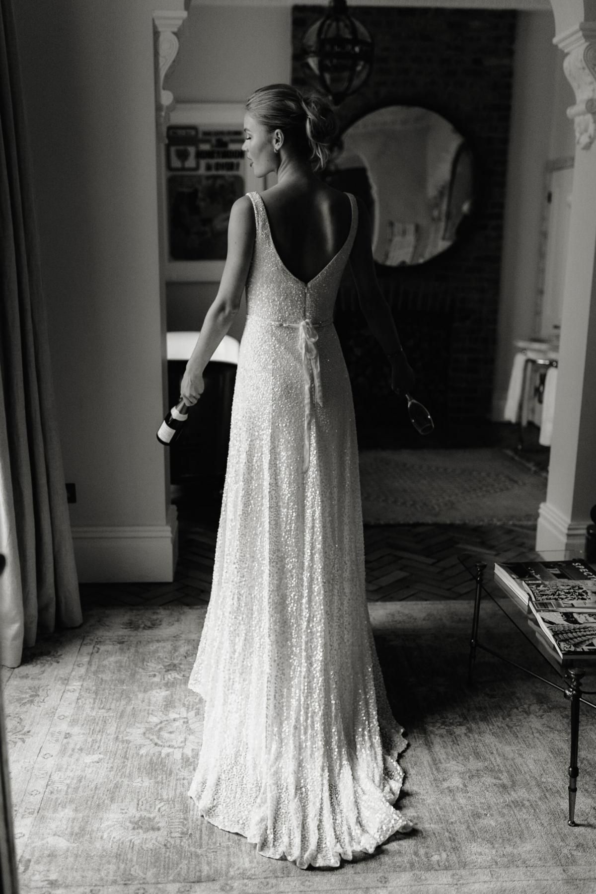 The Lotus gown by Karen Willis Holmes, open back a-line wedding dress with beading.