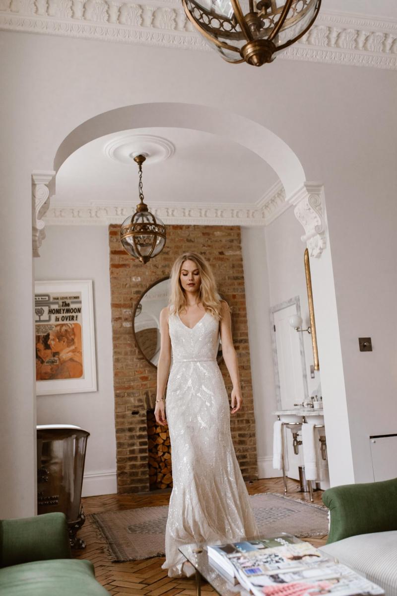 The Rhiannon gown by Karen Willis Holmes, fit and flare sequin wedding dress.