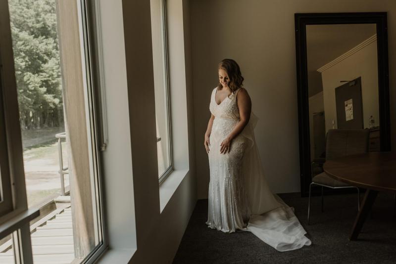Real bride Amy wore the Luxe Fontanne wedding dress by Karen Willis Holmes.