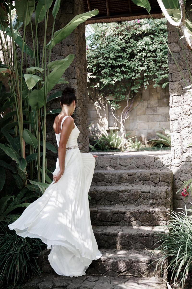 The Daisy gown by Karen Willis Holmes, flowy wedding dress with chiffon skirt and sheer elements.