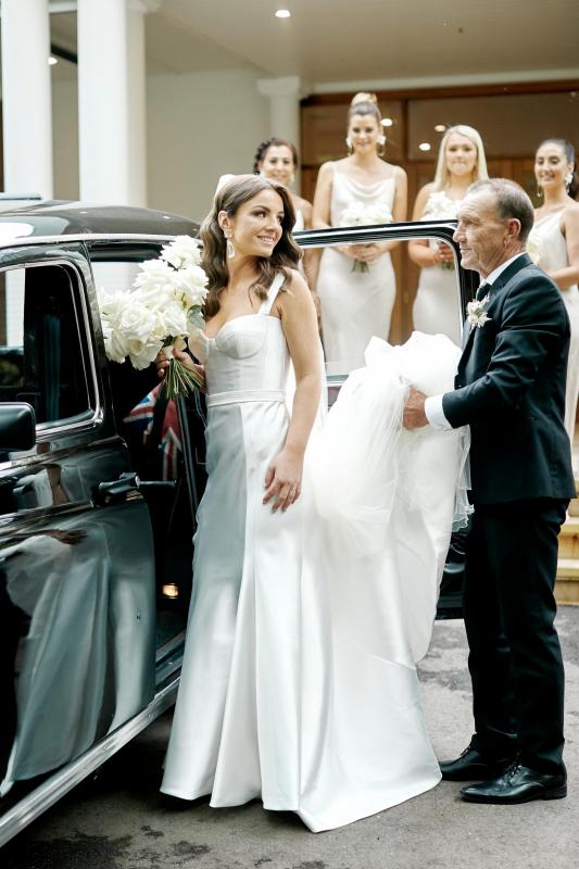 Real bride Erin wore the Bespoke Blake/Prea wedding dress by Karen Willis Holmes.