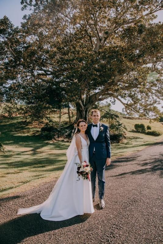 Real bride Madison wore the Bespoke Shelly/Camille wedding dress by Karen Willis Holmes.