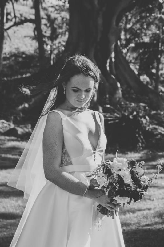 Real bride Madison wore the Bespoke Shelly/Camille wedding dress by Karen Willis Holmes.