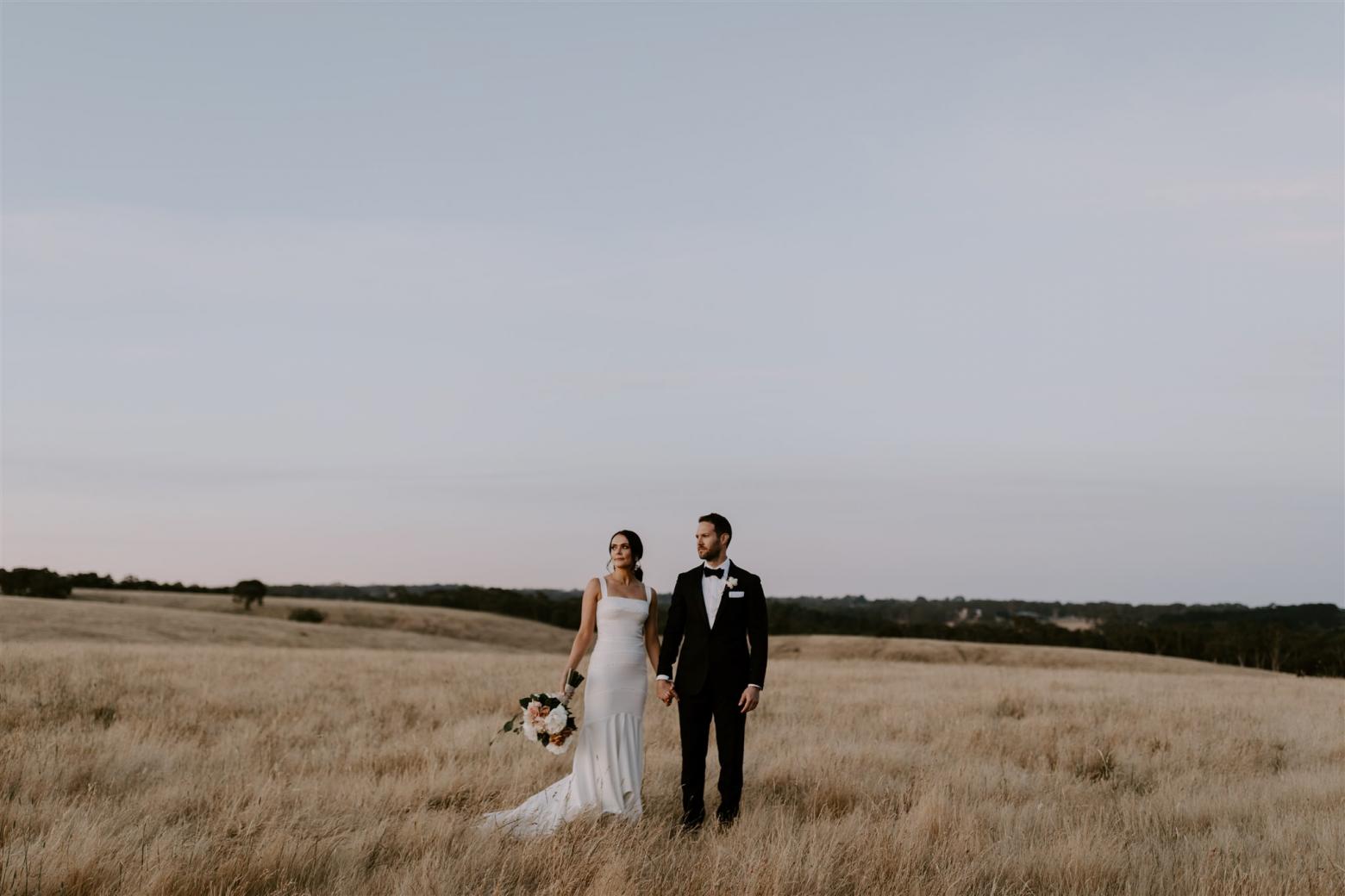 KWH bride Rachael and Adam in a picturesque field. Rachael wears the Violet gown.