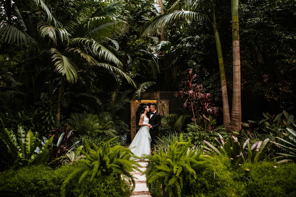 KWH bride Win wears the Modern A-line Aisha gown by Karen Willis Holmes, a non-traditional wedding dress in this fairytale garden wedding.