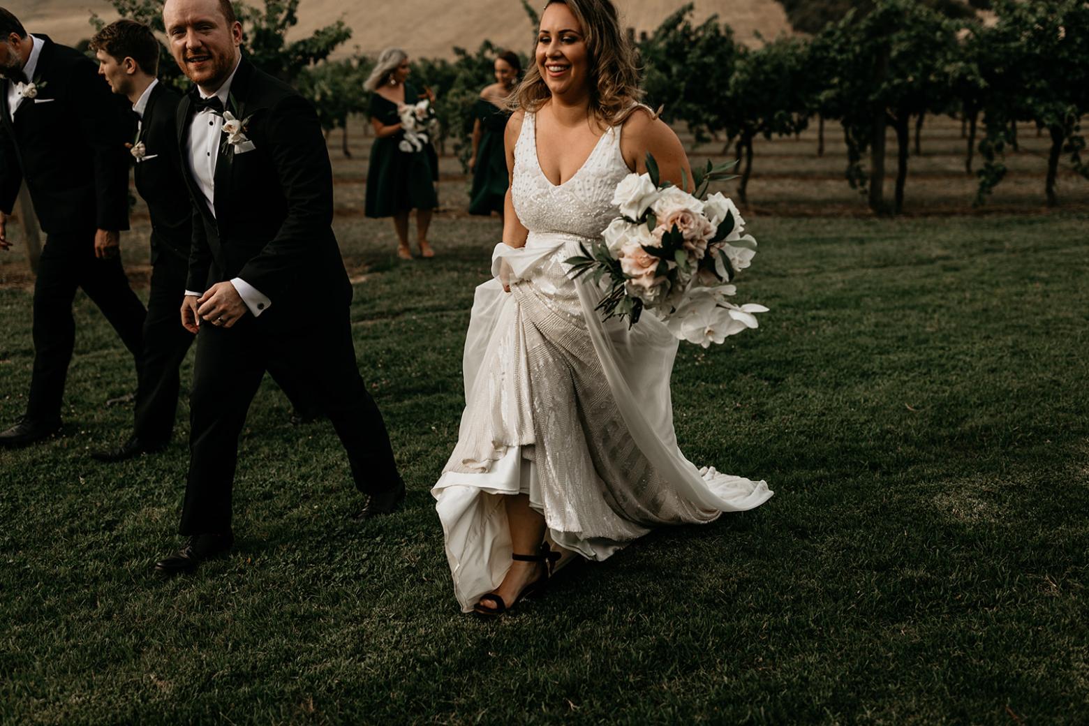 Real bride Liana wore the Luxe Fontanne wedding dress by Karen Willis Holmes.