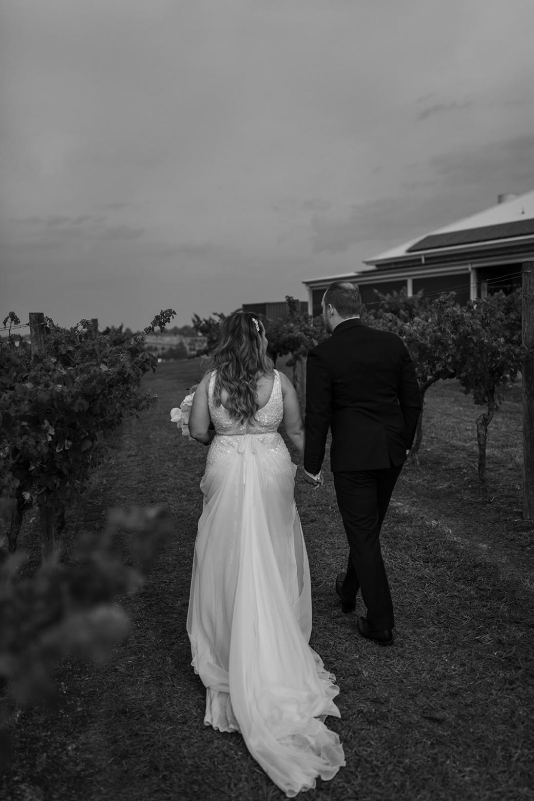 Real bride Liana wore the Luxe Fontanne wedding dress by Karen Willis Holmes.