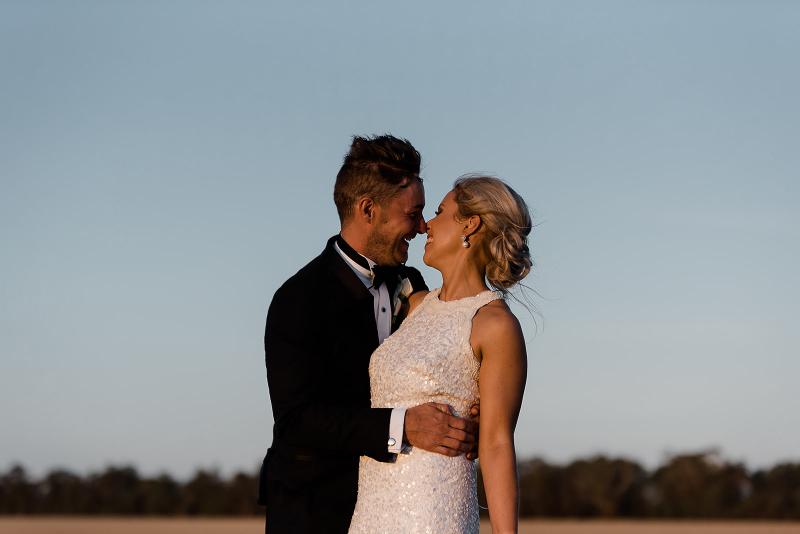 Real bride Laura wore the Luxe Cindy wedding dress by Karen Willis Holmes.
