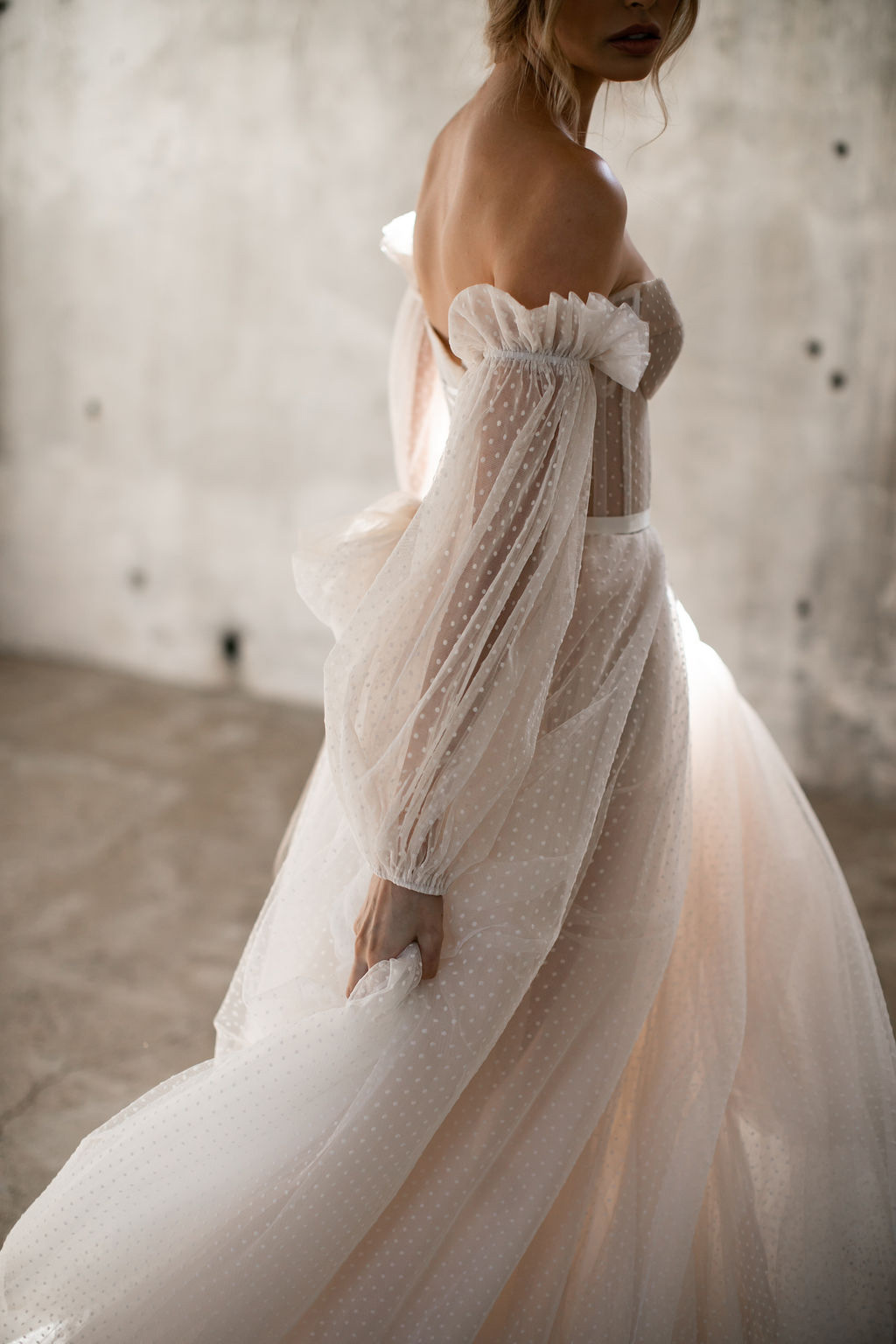 The Audrey wedding dress by Karen Willis Holmes, an a-line classic wedding dress with customizable sleeves