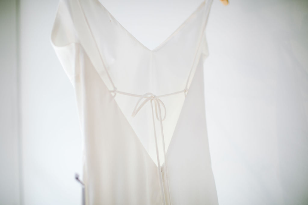 Bias silk mini dress with delicate straps at Karen Willis Holmes
