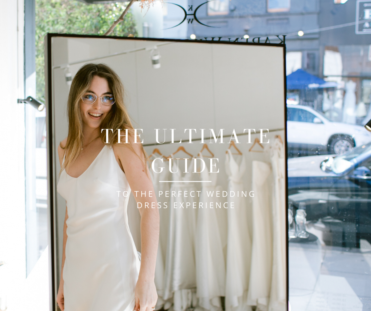 The ultimate dress shopping guide - Bride trying on minimal bias silk slip dress in Karen Willis Holmes wedding dress boutique
