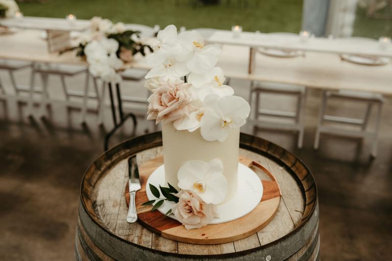 Flowered wedding cake for real bride Brennah's winery wedding.