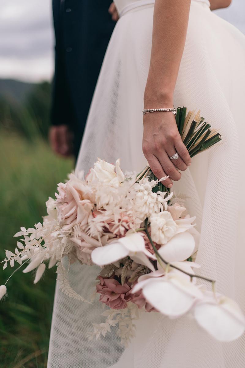 KWH bride Samantha's timeless bridal bouquet full of soft pinks, blush and white. Bride wears the Esther wedding dress.
