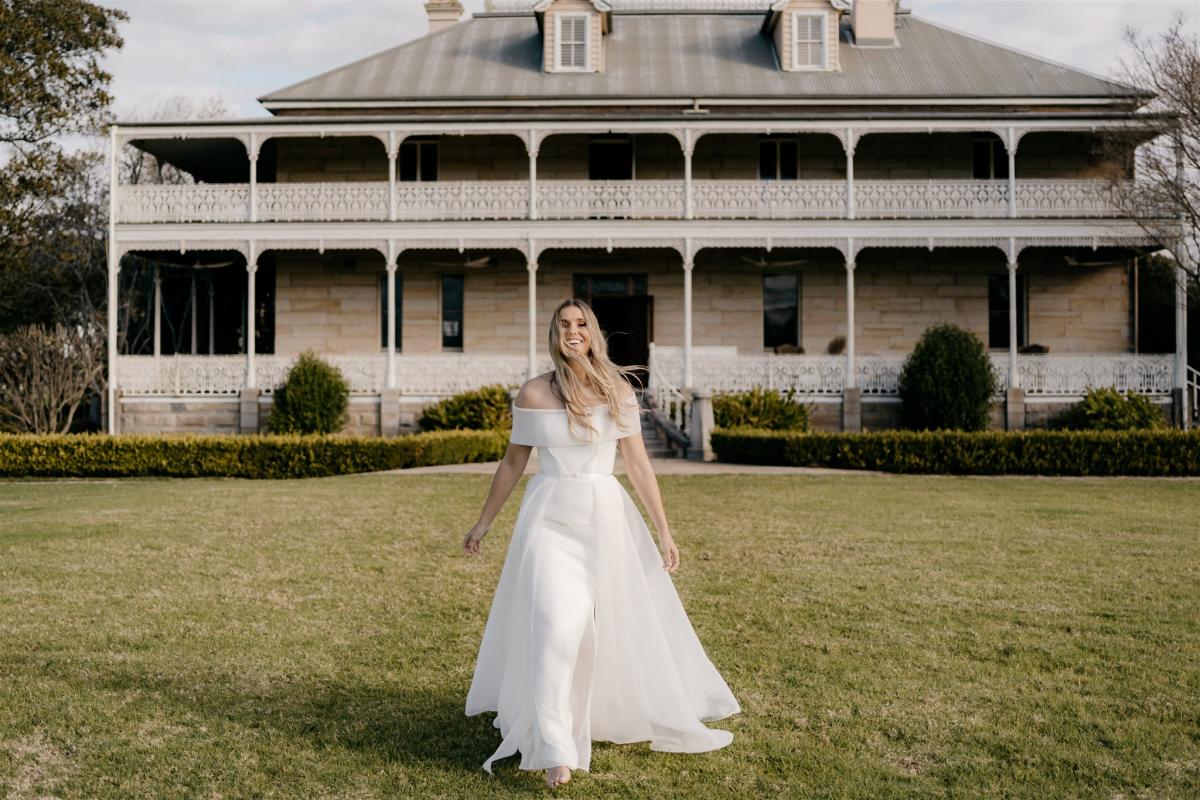 Model wears Esther A-line wedding dress style silhouette in sculptural mesh by Karen Willis Holmes
