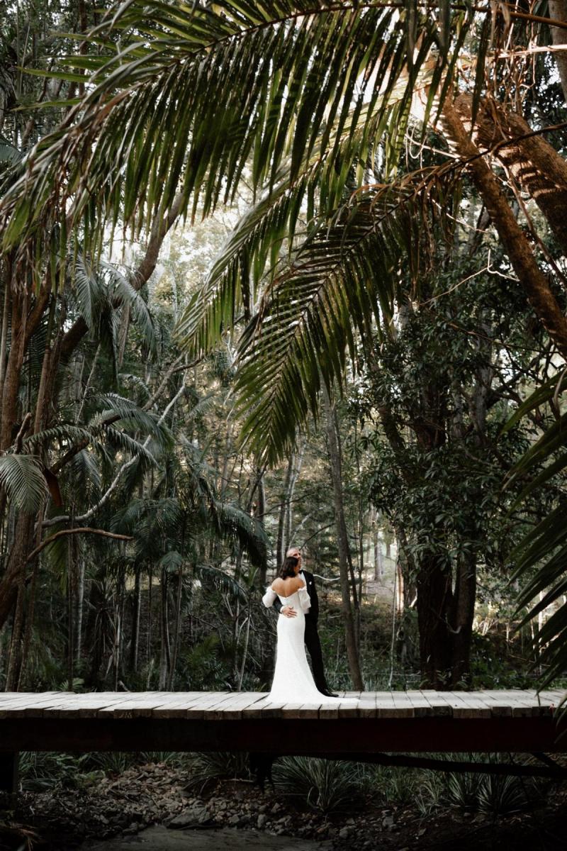 KWH bride Lidia with husband Dayne in forest of Tweed Coast, bride wears the lace Vivienne gown by Karen Willis Holmes.