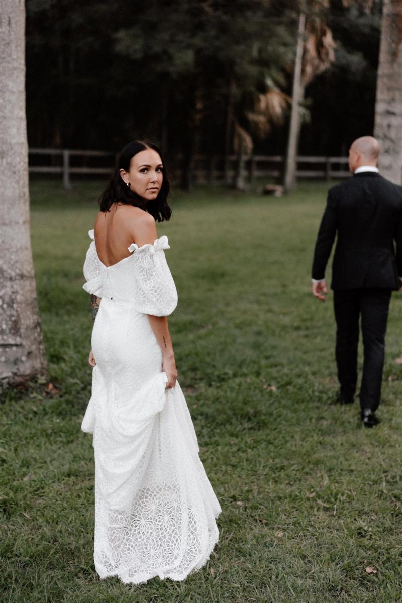 Real bride Lidia wears the Vivienne wedding dress to her open church wedding, a floral lace wedding dress by Karen Willis Holmes for the boho bride