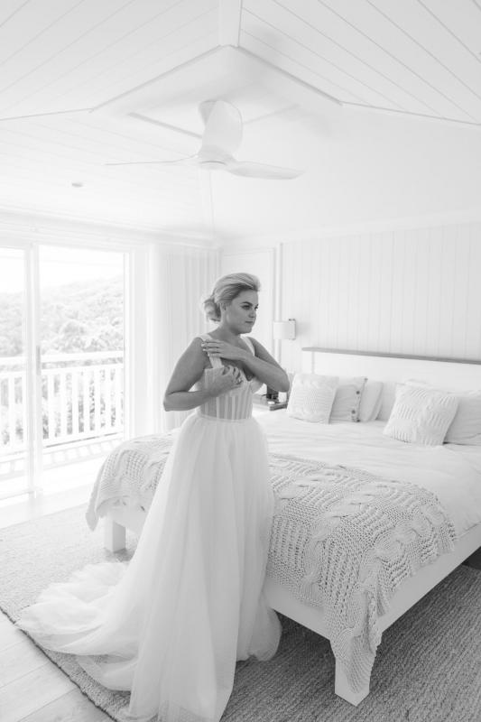 Real bride Arabella getting ready for her Sydney wedding, wearing the Audrey gown; a romantic polka dot wedding dress by Karen Willis Holmes.