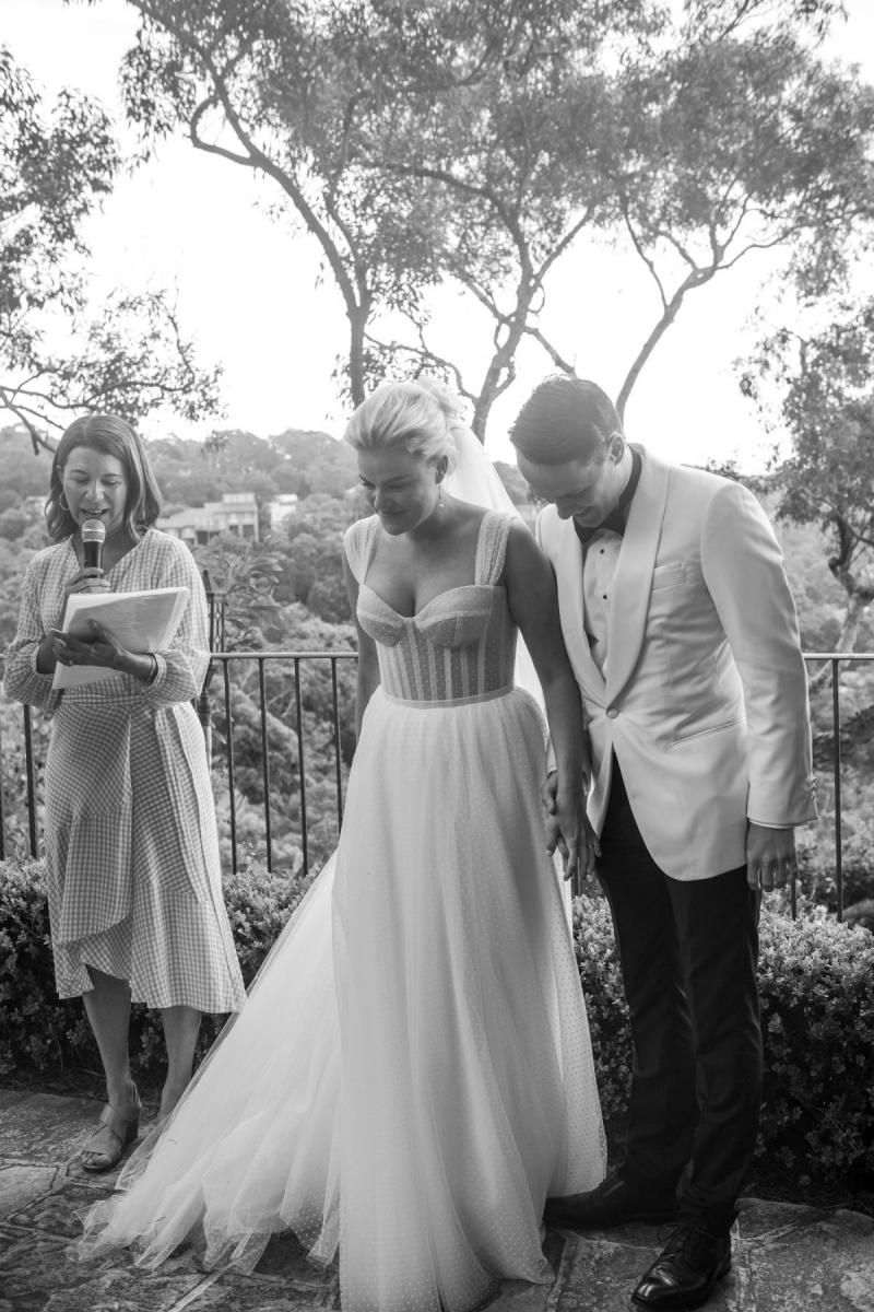 Real bride Arabella wears the Audrey gpwn by Karen Willis Holmes to her intimate, small wedding ceremony.