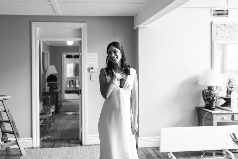 Real bride April getting ready for her Sydney wedding, wearing the Arabella gown by Karen Willis Holmes.