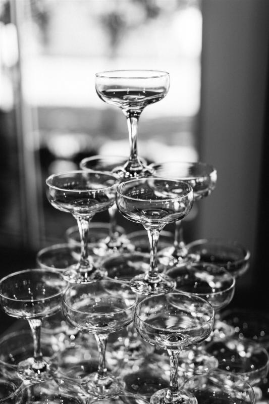 Stylish champagne glasses used for styling at real bride Bre's wedding reception
