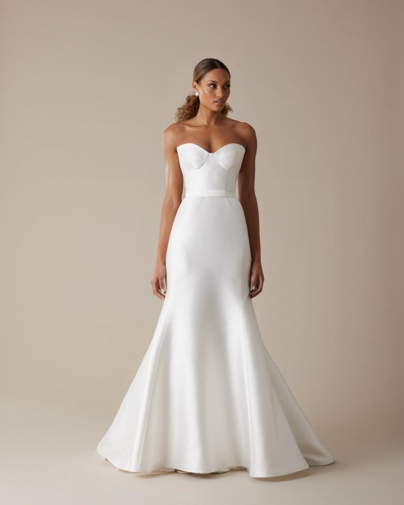 The Blake bodice by Karen Willis Holmes, a simple bustier wedding dress bodice paired with the elegant Alexia skirt.