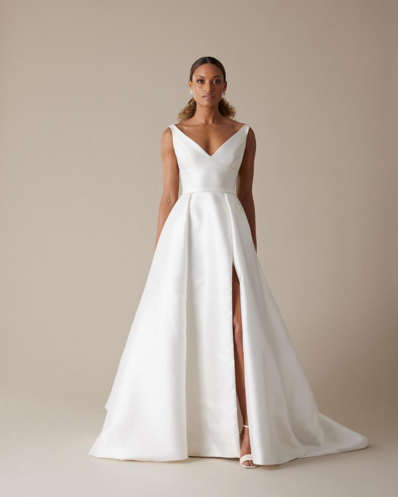 The Leonie bodice by Karen Willis Holmes, a simple V-Neck wedding dress bodice with straps paired with the Elizabeth skirt.