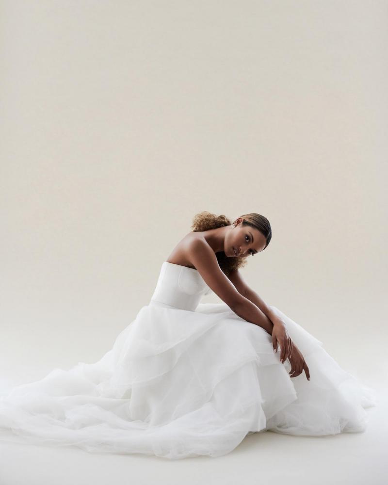 The Blake bodice by Karen Willis Holmes, a simple bustier wedding dress bodice paired with the tulle Marina skirt