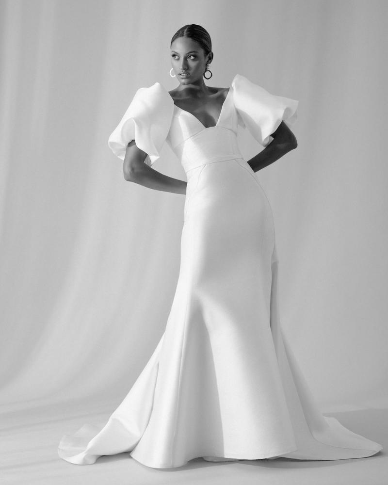 B&W image of the Taryn bodice by Karen Willis Holmes, a simple, U-neckline wedding dress bodice with straps paired with the simple Alexia skirt.