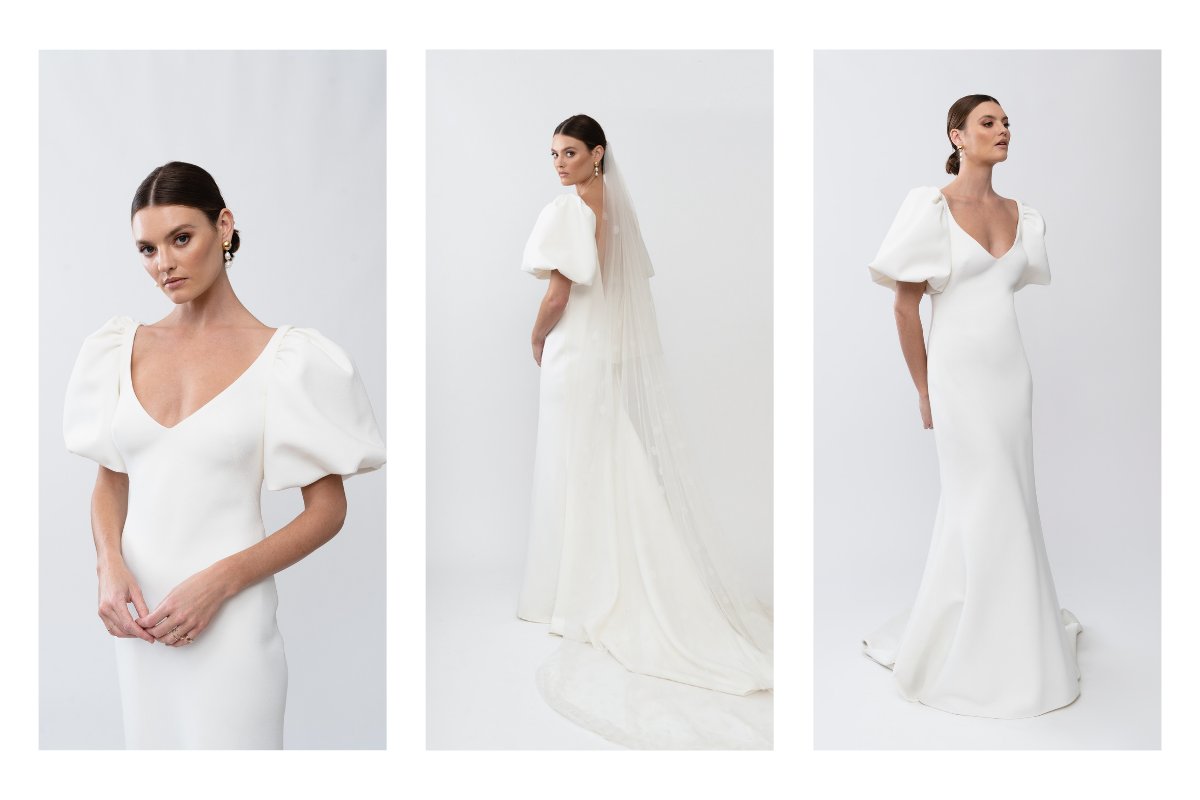 The Shelby gown by Karen Willis Holmes, a simple crepe fit and flare wedding dress with bubble sleeves.