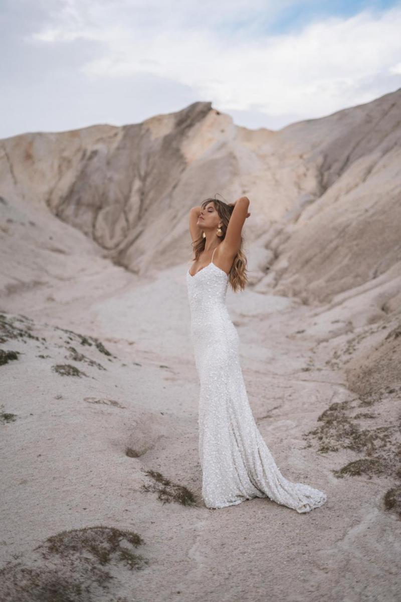 The Anya gown by Karen Willis Holmes, fit and flare v-neck beaded wedding dress.