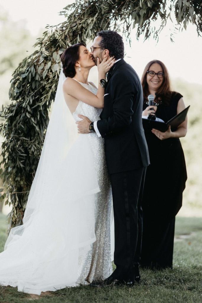Real bride Melody wore the Luxe Cindy wedding dress by Karen Willis Holmes.
