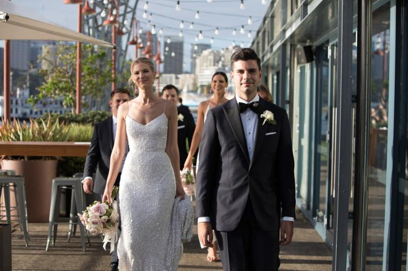 Real bride Nicole wore the Luxe Anya wedding dress by Karen Willis Holmes.