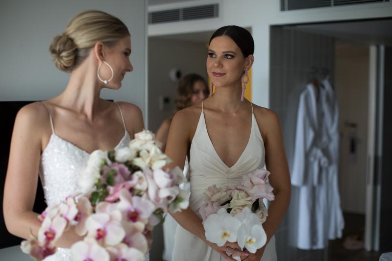 Real bride Nicole wore the Luxe Anya wedding dress by Karen Willis Holmes.