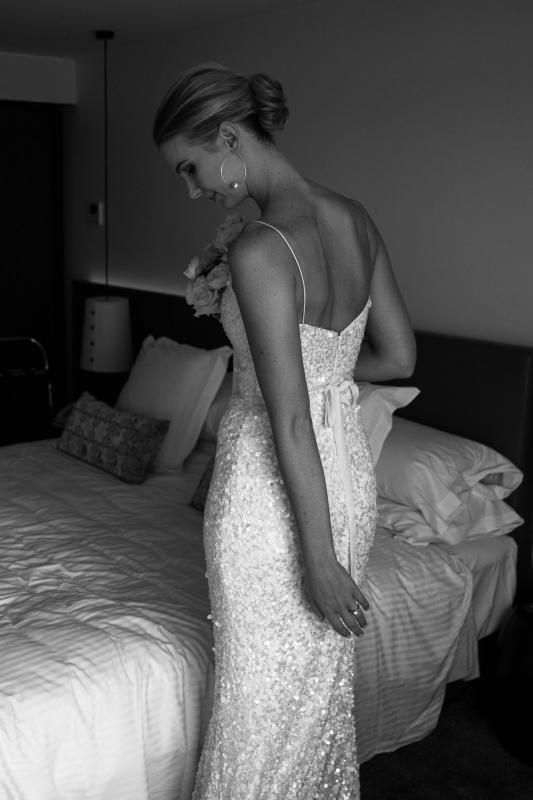 Real bride Nicole wore the Luxe Anya wedding dress by Karen Willis Holmes.