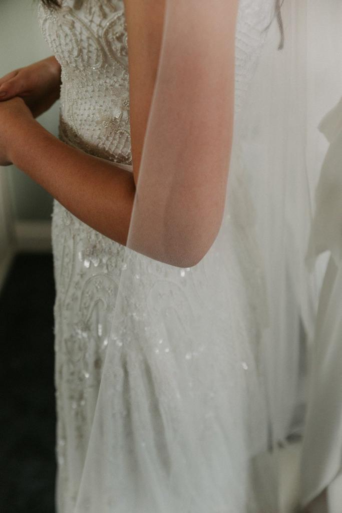 Real bride Lara wore the Luxe Beatrice wedding dress by Karen Willis Holmes.