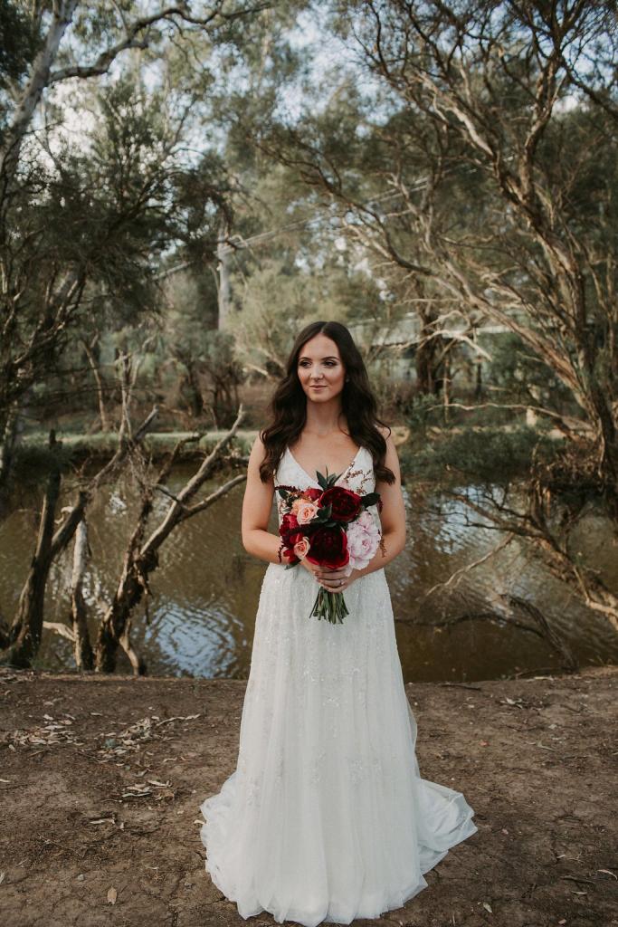 Real bride Lara wore the Luxe Beatrice wedding dress by Karen Willis Holmes.