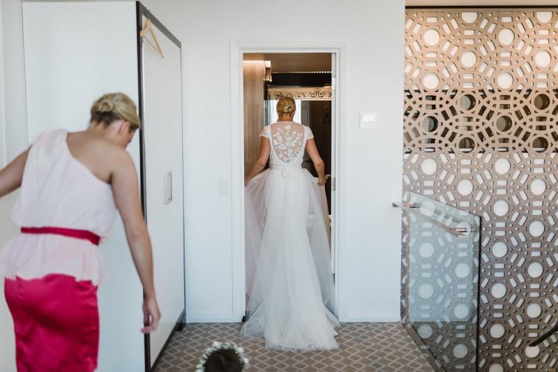 Real bride Chloe wore the Luxe Caitlyn wedding dress by Karen Willis Holmes.