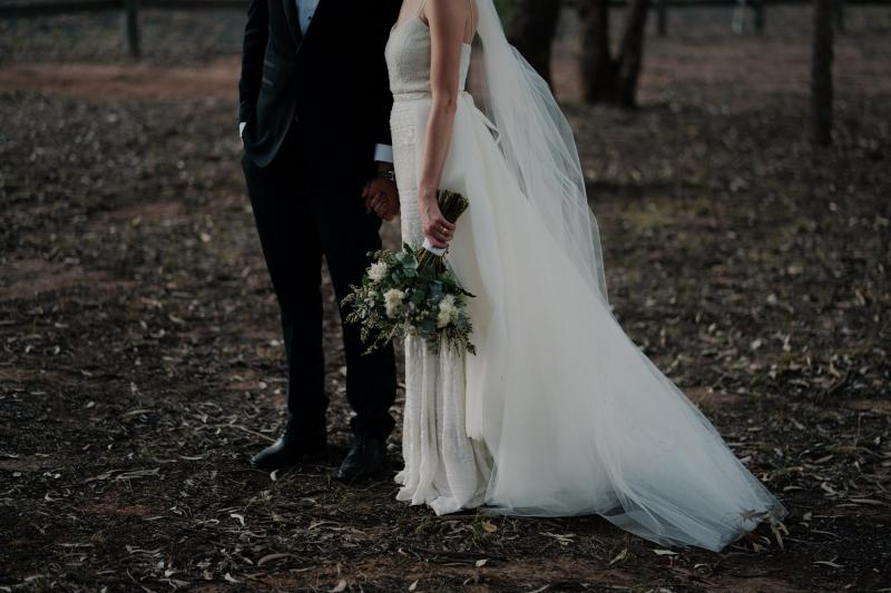 Real bride Danielle wore the Luxe Donna wedding dress by Karen Willis Holmes.