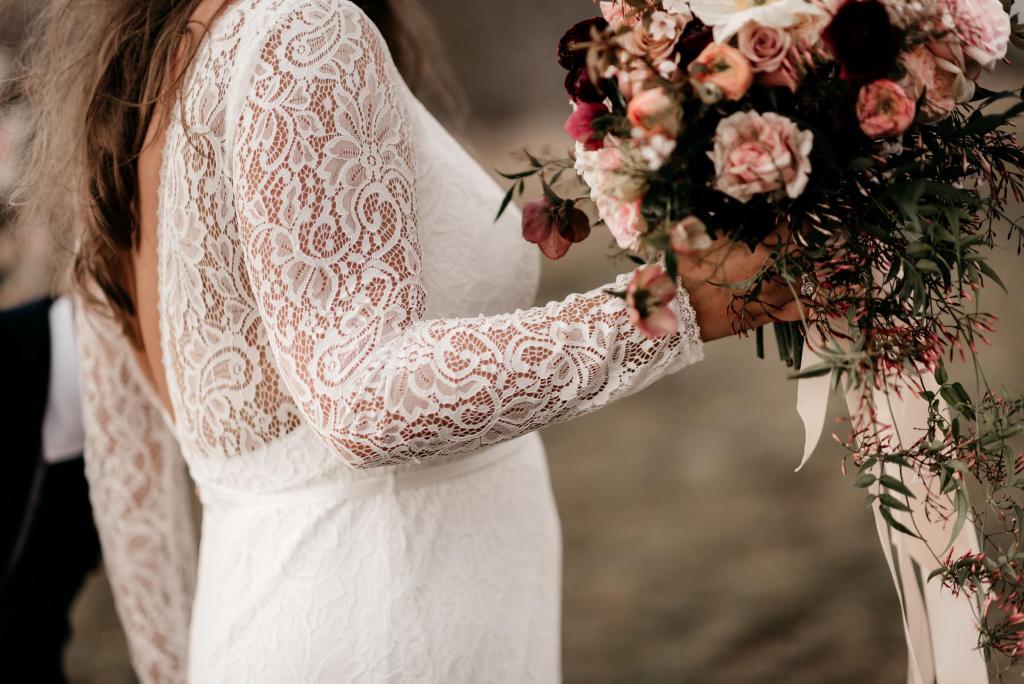 Real bride Zoe wore the Wild Hearts Karina wedding dress by Karen Willis Holmes.