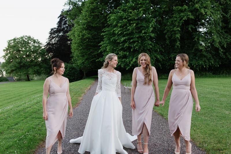 Real bride Vanessa wore the Bespoke Kitty/Melanie wedding dress by Karen Willis Holmes with our lace crop top Posy.