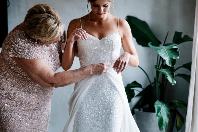 Real bride Colleen wore the Luxe Lottie wedding dress by Karen Willis Holmes.