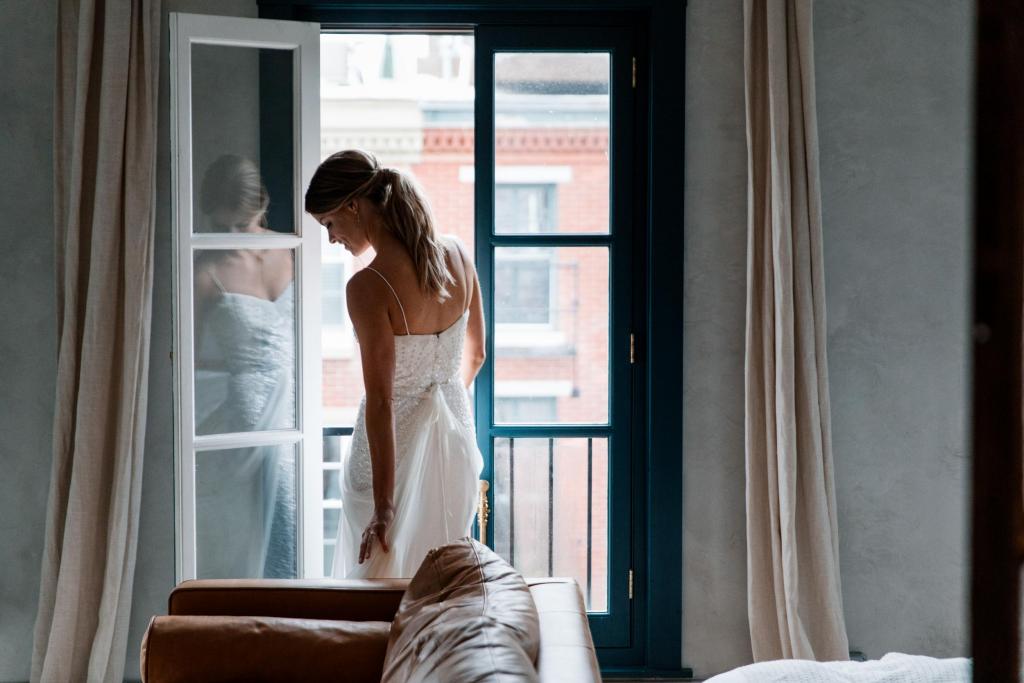 Real bride Colleen wore the Luxe Lottie wedding dress by Karen Willis Holmes.