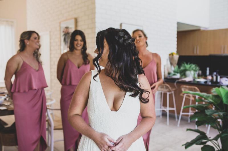 Real bride Bree wore the Wild Hearts Nadia wedding dress by Karen Willis Holmes.