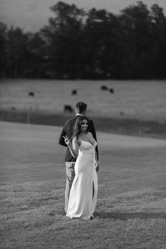 Real bride Trilby wore the Bespoke Emelia wedding dress by Karen Willis Holmes.
